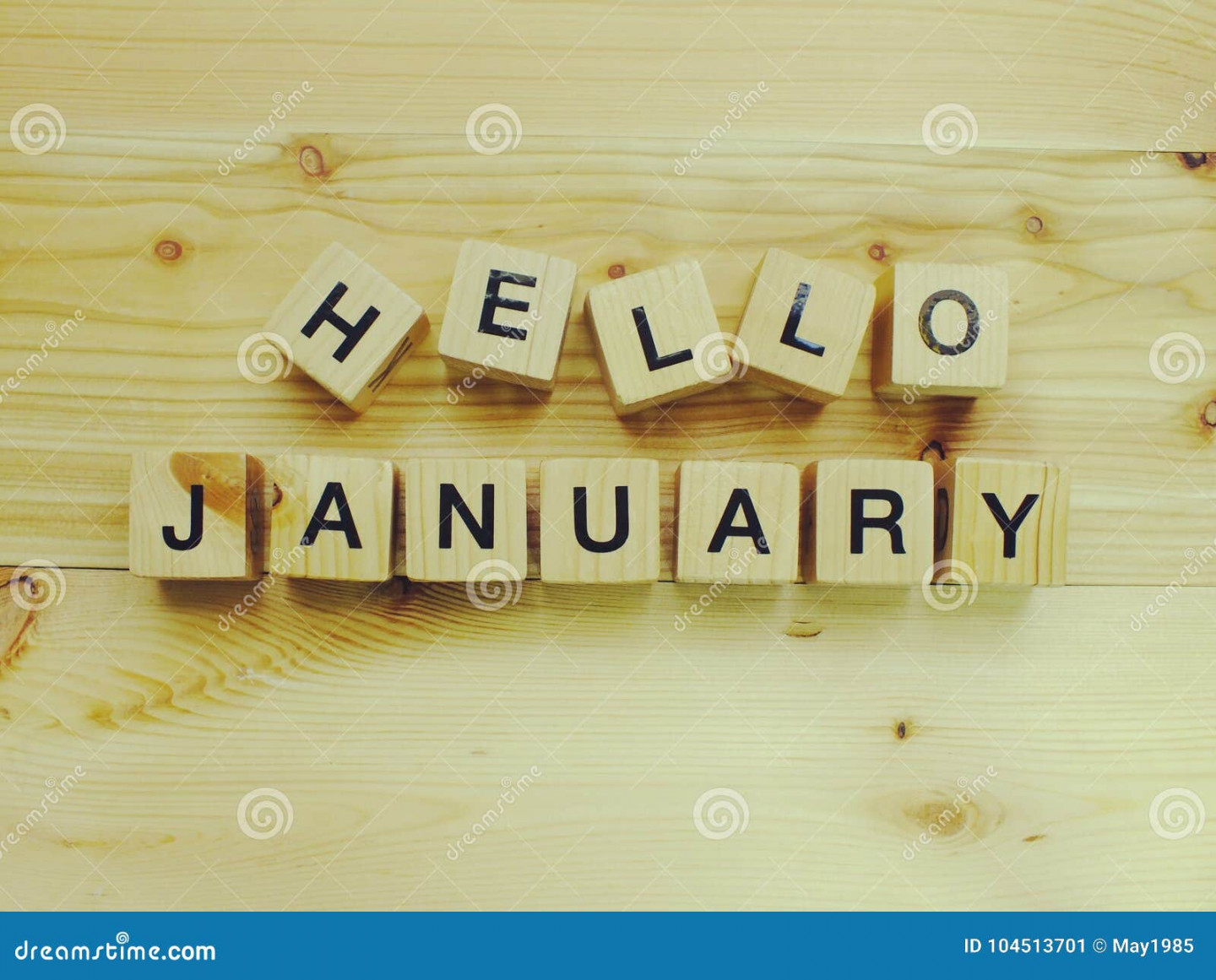 Hello January Wooden Block Alphabet Letters on Wooden Background