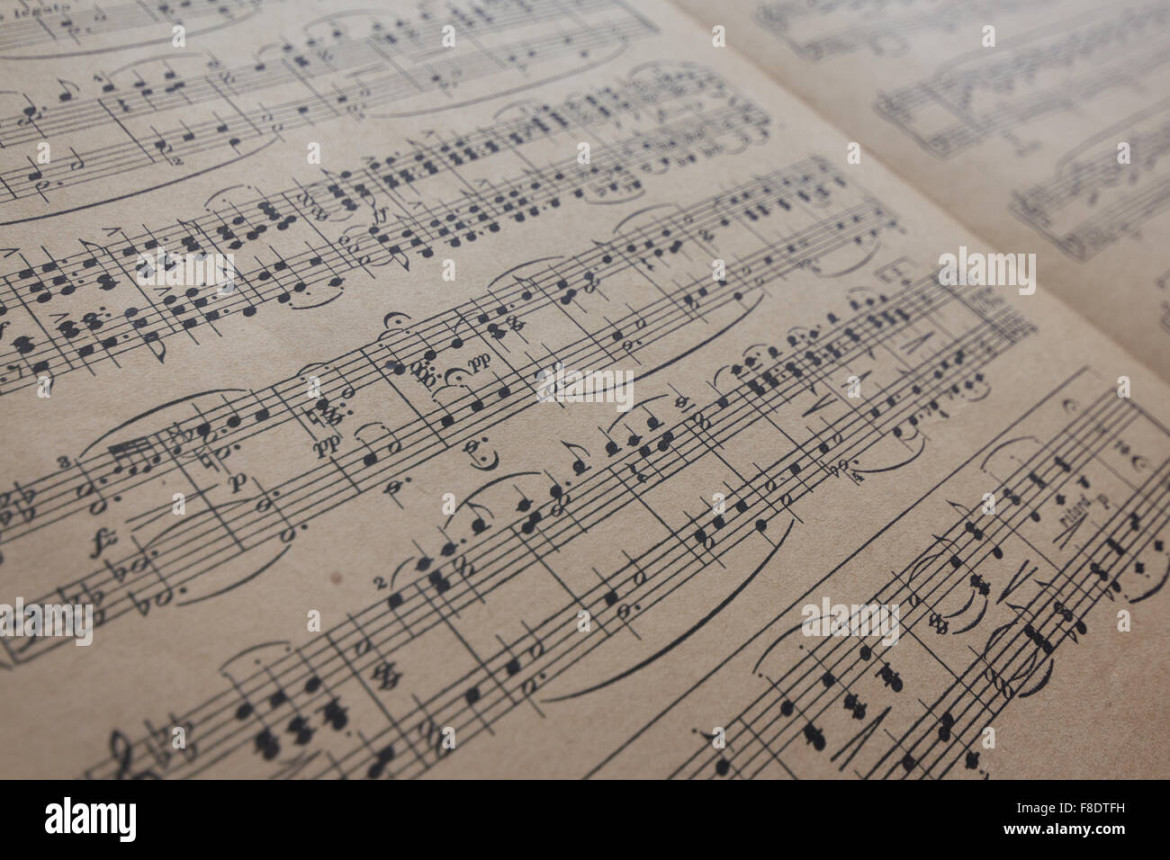 old music sheet - music notes on vintage paper Stock Photo - Alamy