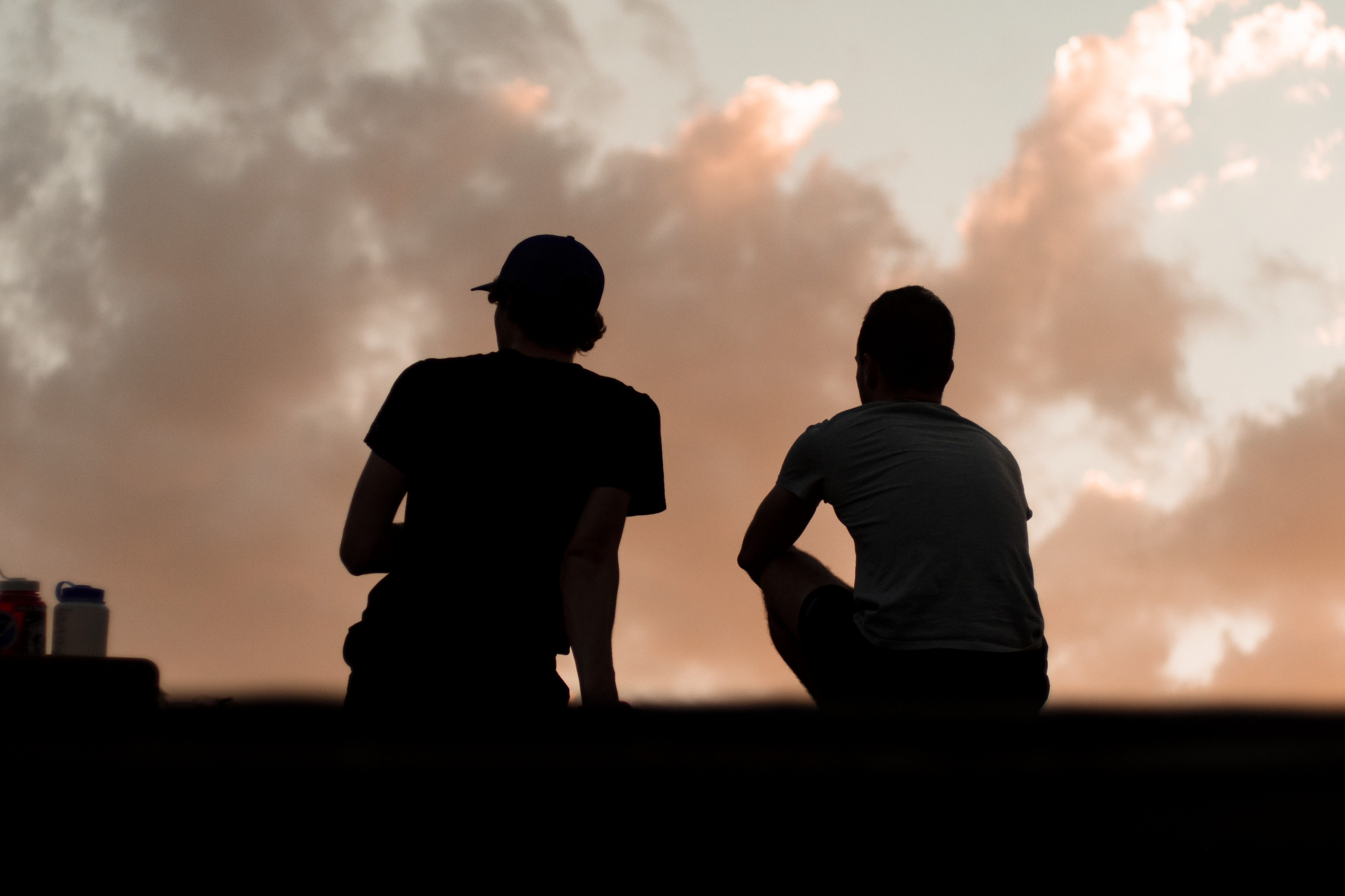 ITAP of two people on a roof watching the sunset