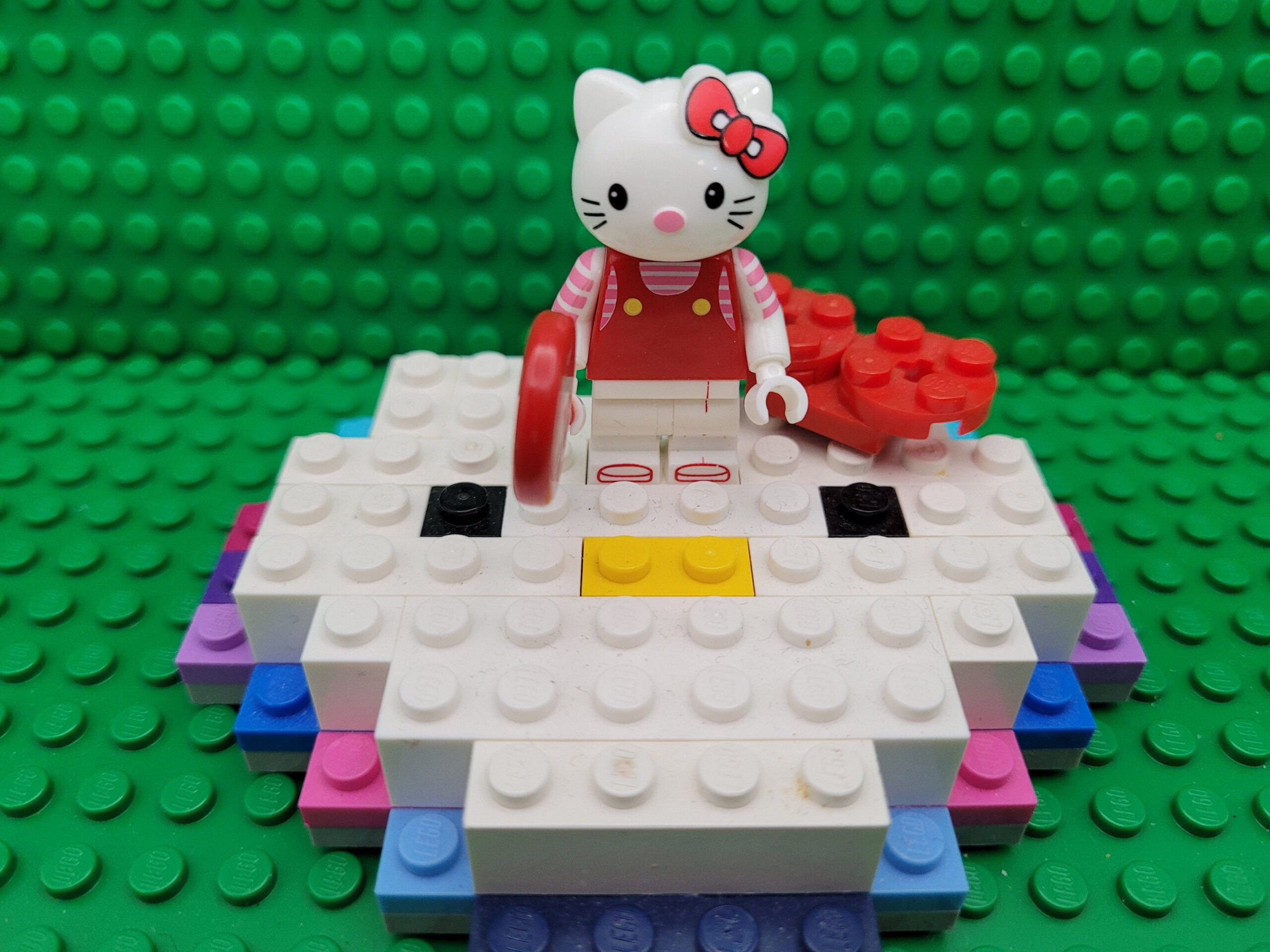 Hello Kitty Figure on a HK Face Hand Built From Lego and Mega